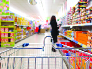 Woman at the supermarket with trolley